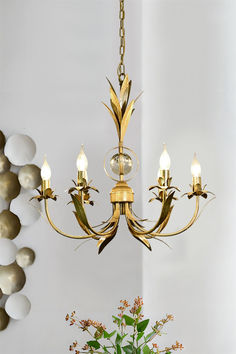 Revel in the glow of this Rodrick 6-Light Chandelier as it fills your home with vintage glamour. This chandelier creates a dramatic effect in any lavish space including a chic living room, luxurious master bathroom, or an opulent foyer. with its lustrous brass finish and durable construction, this chandelier offers a warm glow that will illuminate your home with style for years to come.