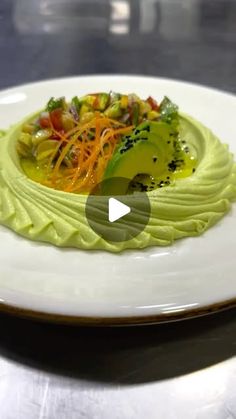 a white plate topped with food on top of a table