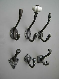 four wrought iron door handles and knobs