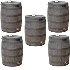 four wooden barrels sitting next to each other