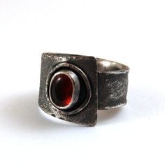 "Garnet silver ring. Dimensions: -stone 0.5 - 0.7 cm, 0.2 - 0.28\" -band width 0.9 - 1.6 cm, 0.35 - 0.63\" -size adjustable (please write me your size, I'll set it)." Handmade Modern Wide Band Ring, Modernist Open Band Ring For Gifts, Modernist Open Band Ring As Gift, Modernist Wide Band Open Ring Gift, Modern Wide Band Open Band Ring As Gift, Modern Silver Ruby Ring With Polished Finish, Modern Wide Band Gemstone Rings, Modern Wide Band Ring Stamped 925 Gift, Modern Handmade Wide Band Jewelry