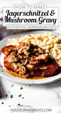 a white plate topped with meat covered in mushroom gravy