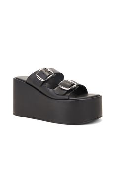 Find COPERNI Buckle Wedge Sandal on Editorialist. Coperni Buckle Wedge Sandal in Black Calfskin upper with rubber sole. Made in Italy. Dual vamp buckle closures. Round toe. Approx 47mm/ 1.8 inch platform Approx 95mm/ 3.75 inch heel. CRNF-WZ42. COPSH56841. About the designer: Denim Sandals, Black Wedge Sandals, Buckle Sandals, Denim Branding, Wedge Sandal, Thong Sandals, Platform Wedges, Dark Navy, Wedge Heels