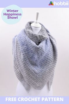 a crocheted shawl on a mannequin with the text winter happiness shawl free crochet pattern