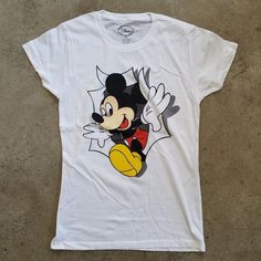 a t - shirt with an image of mickey mouse on it