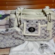 Coach Purse Brand New. White With Purple C. Has A Matching Smaller Bag That Attached To Purse And Can Be Taken Off. Beautiful Bag White Coach Shoulder Bag For Formal Occasions, Formal White Coach Shoulder Bag, Designer White Coach Shoulder Bag, Everyday Purple Coach Shoulder Bag, Purple Coach Purse, Coach Purple Bag With Adjustable Strap, Coach Purple Tote Bag, Coach Purple Bags For On-the-go, Coach Leather Bag