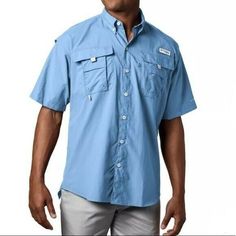 Men’s PFG Bahama™ II Short Sleeve Shirt Men’s PFG Bahama Runs Large, Consider sizing down Measurements: 26.5" across chest 23" across shoulders 30" Shirt length 9.5" sleeve length Details Style # FM7047 FISH EASY Designed specifically for anglers, this lightweight, Relaxed Fit, nylon shirt dries fast, keeps you cool, and protects against UV rays. COOLING Mesh-lined back vents let in and out a cooling breeze—perfect in hot, humid weather. PERFORMANCE DETAILS A rod holder provides hands-free conve Mens Fishing Shirts, Grey Goose, Instagram Wedding, Rod Holder, Jewelry Women, Boys Baby, Wedding Pics, Columbia Sportswear, Fishing Shirts