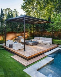 an outdoor living area next to a swimming pool