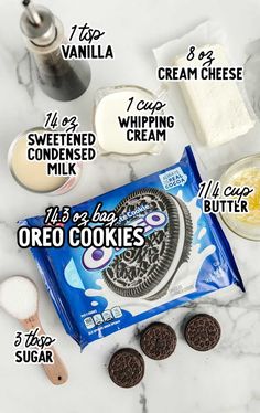 ingredients to make oreo cookies laid out on a marble counter top with text overlay