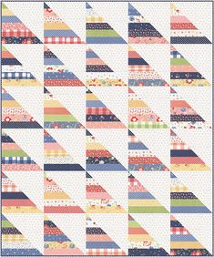 a quilt with many different colors on it