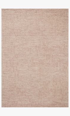 a beige rug with small squares on it