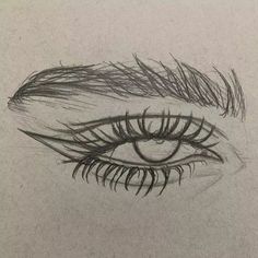 a pencil drawing of an eye with long lashes