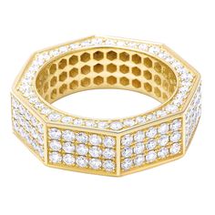 a gold ring with rows of diamonds on it