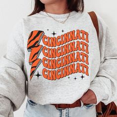 - Shirt Materials: 50% Combed Cotton And 50% Polyester - Size: The Shirt Runs True To Size. 5 Sizes Available: S, M. L, Xl, 2xl,3xl - Ship: Fast Shipping. Made And Shipped From Usa. - Please Follow Me For New Items. Bengals Shirt Vinyl, Bengals Football Shirts, Bengals Sweatshirt Cricut, Bengals Shirt Ideas, Bengals Sweatshirt, Sports Merch, Football Crewneck, 90s Sweatshirt, Formal Business