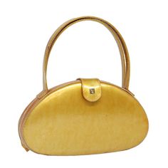 Brand : Loewe Color : Yellow / Gold Material : Enamel Size(Cm) : W24cm X H13cm X D5cm(Approx) / Handle Drop 12cm(Approx) Size(Inch) : W9.4 X H5.1 X D2.0inch(Approx) / Handle Drop 4.7inch(Approx) Style : Hand Bag Accessory : There Is No Item Box And Dust Bag. We Will Send Only The Item Which Is Put In The Photo. Product No. : - Serial No. : - Made In : Spain Rank : C Sku : Ar12404 Condition : Outside : Surface : Rubbing , Sun Burn , Discoloration Handle : Sun Burn , Rubbing , Discoloration , Part Classic Yellow Shoulder Bag With Detachable Handle, Elegant Yellow Shoulder Bag With Top Carry Handle, Elegant Yellow Shoulder Bag With Removable Pouch, Elegant Yellow Tote Shoulder Bag, Elegant Yellow Shoulder Bag With Top Handle, Elegant Yellow Satchel For Formal Occasions, Yellow Gold Rectangular Travel Bag, Classic Yellow Satchel With Detachable Handle, Classic Yellow Satchel With Top Carry Handle