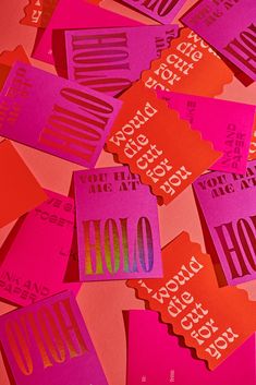 pink and orange stickers with the word hoo on them are scattered around each other