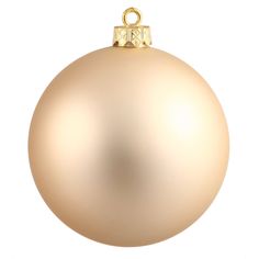 a gold christmas ornament on a white background