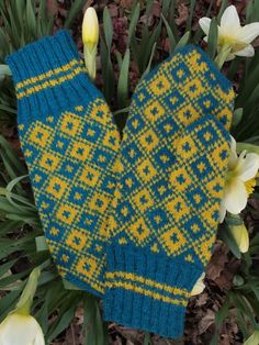 Knitted with two colored yarn (bright yellow and sky blue) in traditional Estonian fair-isle style.  Tightly knitted using 0-size needles and worsted weight yarn, they are perfect to block wind and wear in winter. This pattern comes from Vaivara area in Ida-Viru County, Estonia and is well used throughout the country due to simple beauty. The tight 2x2 ribbing keeps your wrists warm during the coldest winter days.Women's size, also available for custom order in any sizes. Multicolor Fair Isle Pattern For Winter, Fitted Knitting Patterns For Winter, Fitted Winter Crochet Patterns, Fitted Crochet Patterns For Winter, Multicolor Nordic Fair Isle Pattern, Nordic Fair Isle Multicolor Pattern, Hand Knitted Yellow Knitting Pattern, Yellow Hand Knitted Knitting Pattern, Gift Envelope