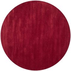 a round red rug on a white background