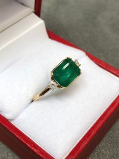 Green Emerald Three Stone Ring In 14k Gold, Three Stone Emerald Ring In 14k Gold, 14k Gold Gia Certified Rings With May Birthstone, 14k Emerald Cut Fine Jewelry Emerald Ring, 14k Emerald Cut Ring Fine Jewelry, 14k Stamped Emerald Cut Emerald Jewelry, Stamped 14k Emerald Cut Emerald Jewelry, Emerald Rings For May Birthstone Stamped 14k, Heirloom Emerald Ring With Gia Certification