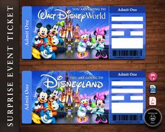 two disney world tickets sitting on top of a wooden table