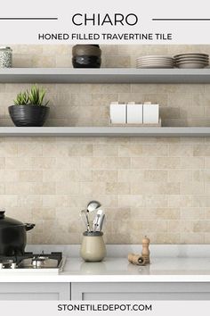 a stove top oven sitting inside of a kitchen next to a shelf filled with pots and pans