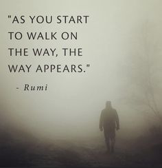 a person walking in the fog with a quote from rumi