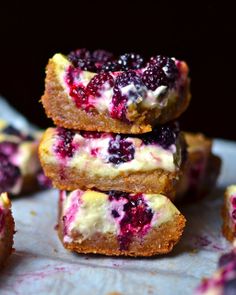 three blueberry cheesecakes stacked on top of each other