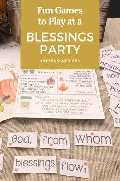 a table topped with lots of cards and words that read fun games to play at a blessing party