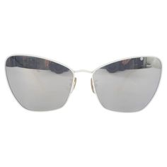 100% authentic Céline butterfly shaped white metal frame sunglasses featuring mirrored lenses. Have been worn and are in excellent condition. Come with case. Measurements Model CL40069U 25C 61*16 140 J Width 14cm (5.5in) Height 5cm (2in) All our listings include only the listed item unless otherwise specified in the description above.