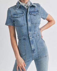 SHORT SLEEVE BUTTON UP WIDE LEG DENIM JUMPSUIT WITH FRONT POCKETS Fabric Contents 68% COTTON 30% POLYESTER 2% SPANDEX Chic Jumpsuit, Jumpsuit Chic, Mary Ann, Good American, Wide Leg Denim, Short Sleeve Button Up, Denim Jumpsuit, Short Sleeve Button, American Made