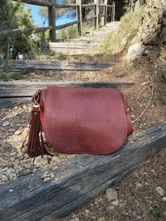 Cognac leather crossbody bag, This bag is a medium size classic crossbody bag. This bag is unlined.  The bag is closed by a magnetic button. This bag you can take every where in any occasion Features : - Cognac leather, - Brass finishing, - Unlined. Size :  - Width 10.2 inch, - Height 8.2 inch, - Adjustable shoulder belt length max 45 inch. If you want to add a boho touch to your bag, buy a suede tassel separately use this link  https://www.etsy.com/it/listing/1524528378/nappina-portachiavi-in-p Daily Use Crossbody Saddle Bag With Magnetic Closure, Cognac Bag With Magnetic Closure, Cognac Shoulder Bag With Magnetic Closure, Cognac Bag With Magnetic Closure For Everyday Use, Cognac Leather Shoulder Bag With Magnetic Closure, Cognac Soft Leather Satchel Saddle Bag, Cognac Soft Leather Saddle Bag Satchel, Leather Saddle Bag With Magnetic Closure For Travel, Brown Leather Saddle Bag With Magnetic Closure