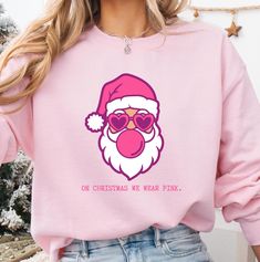 Get into the festive spirit with this cozy Unisex Heavy Blend™ Crewneck Sweatshirt featuring the fun and festive message 'On Christmas we wear pink'. Perfect for staying warm during the colder months while adding a touch of holiday cheer to your wardrobe. Ideal for anyone looking to celebrate Christmas like a Mean Girl. Product features - Cozy medium-heavy fabric blend of 50% cotton and 50% polyester - Classic fit with double-needle stitching for durability - Ribbed knit collar with seam for shape retention - Ethically grown US cotton with low environmental impact dyes - Embroidery decoration available on left chest Care instructions - Machine wash: cold (max 30C or 90F) - Non-chlorine: bleach as needed - Tumble dry: low heat - Do not iron - Do not dryclean Mean Girl, Embroidery Decoration, Celebrate Christmas, Winter Clothing, Mean Girls, Wear Pink, Pink Christmas, Christmas Sweatshirts, We Wear