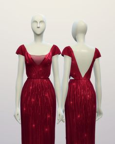 two mannequins dressed in red evening gowns