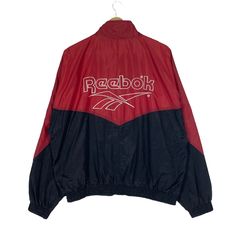 PLEASE ASK ANY QUESTION BEFORE BUYING THIS IS USED CLOTHING PLEASE DONT EXPECTED IT TO BE LIKE NEW OR IN PRISTINE CONDITION REEBOK LIGHT ZIPPER WINDBREAKER JACKET tag Reebok material Polyester 100% saiz on tag M (Medium) Mesasures About ( Approximately) -Armpit to Ampit : Update inch -Length (back collar down) : updated inch Condition : used good condition 7/10 **No Tears And No Stains ** **Have a pen hole see a picture detail** 🎈PLEASE READ THE DESCRIPTION AND POLICY BEFORE BUYING 🎈ACCEPT PAY Red Athleisure Windbreaker For Outdoor Activities, Red Athleisure Outerwear For Streetwear, 90s Style Red Track Jacket For Sports, 90s Style Red Windbreaker For Sports, 90s Red Track Jacket For Sports, 90s Style Red Sports Windbreaker, 90s Red Windbreaker For Streetwear, Red Vintage Windbreaker For Winter, Retro Red Windbreaker For Sports