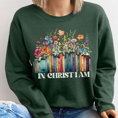 See store for Christmas deadlines!Remembering our identity in Christ gives us faith and strenth for each day .  SWEATER DESCRIPTION *SIZES ARE UNISEX* -I'd suggest your usual size for a more fitted look, or sizing up for a more relaxed fit. *these sweatshirts are extra comfy when oversized  A sturdy and warm sweatshirt bound to keep you warm in the colder months. A pre-shrunk, classic fit sweater that's made with air-jet spun yarn for a soft feel and reduced pilling. Your new favorite sweatshirt Christian Book, Book Shirt, Jesus Shirt, Book Shirts, Jesus Shirts, Christian Books, Faith Based, Fitted Sweater, Knit Collar