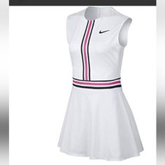 a women's tennis dress with pink, white and black stripes on the side