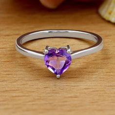 Genuine Heart Shape Amethyst Solitaire February Birthstone Ring ~ Dainty Engagement / Minimalist Fashion New! Retail Price: $99 Metal: Solid 925 Sterling Silver Finish: High Polish Hallmark: Stamped 925 Stone: Amethyst Stone Weight: 0.50 Carats Stone Shape: Heart Shape Sizes Available: 7, 8, 9 February Birthstone Gift Box & Jewelry Cleaning Cloth Included! #080112 Available In Ruby, Emerald, Citrine, Sapphire & Aquamarine Perfect Genuine Gemstone Solitaire Ring! Dainty Ring Is A Perfect Everyday Heart-shaped Amethyst Ring For Anniversary, Heart Shaped Amethyst Jewelry For Wedding, Purple Heart-shaped Amethyst Promise Ring, Heart-shaped Amethyst Wedding Jewelry, Heart Cut Amethyst Birthstone Ring In Sterling Silver, Sterling Silver Heart Cut Amethyst Ring Gift, Heart Cut Amethyst Ring In Sterling Silver, Heart-shaped Purple Amethyst Promise Ring, Purple Sterling Silver Rings For Valentine's Day