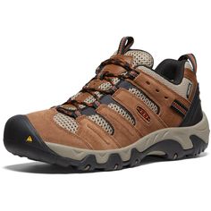 a brown hiking shoe on a white background