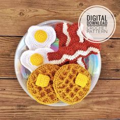 crochet breakfast plate with fried eggs, bacon and waffles on it