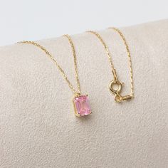 "The pink tourmaline stone represents the woman. It is a stone that symbolizes harmony and balance. Our rectangular pink tourmaline necklace, with its minimalist design, is a jewel that you can use daily and on special occasions. It is a nice gift for yourself and your loved ones. The birthstone of those born in october is pink tourmaline. 🔸🔸 Our elegant, style and stylish products suitable for special occasions and daily use are produced with love and care for you and your loved ones. 🔸🔸 Al Pink Gemstone Pendant Birthstone Necklace, Elegant Pink Pendant Birthstone Necklace, Pink 14k Gold Pendant Necklace, Pink Sapphire Necklace For Gift, Pink Fine Jewelry Necklace For Gift, Pink Birthstone Necklace For Gift, Pink Gemstone Birthstone Necklace In Sterling Silver, Pink Gold Tourmaline Jewelry With Gemstones, Rose Gold Pink Sapphire Necklaces Gift