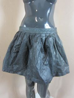 Genuine 90's leather mini skirt , it has a zip and a press stud to close and is in reasonable vintage condition. Dimensions: Length: 15 Inches. Waist: 28 Inches Made by LUXE Rara Skirt, Goth Skirt, Black Leather Skirt, Boho Skirt, Leather Mini Skirt, Black Leather Skirts, Vintage Rock, Boho Skirts, Skirt Vintage