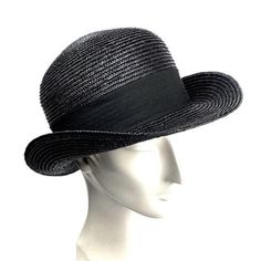 Bowler straw hat made in 8/9 milimeters black straw braid. Adorned with an excellent 50 millimeters wide black grosgrain ribbon and finished with a bow to the right of the hat. Custom hat options: 1- You can choose between a grosgrain ribbon inside or a genuine leather inner band. 2- I usually wear a black grosgrain ribbon as a hat trim, but if you want you can choose your favorite color from my grosgrain color chart. Just write a brief note when you place the order. The price is the same. For i Classic Wide Brim Top Hat For Spring, Classic Brimmed Top Hat For Spring, Classic Black Panama Hat, Classic Boater Hat With Curved Brim For Spring, Classic Brimmed Boater Hat For Travel, Classic Boater Hat For Spring Travel, Classic Brimmed Summer Top Hat, Classic Spring Travel Boater Hat, Classic Cloche Hat With Curved Brim For Summer