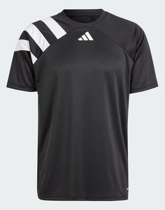 Find your football look in this Fortore 23 jersey. Created to keep your team standing out on the pitch, this eye-catching shirt shows off a design inspired by '90s adidas Equipment style. Moisture-absorbing AEROREADY keeps you dry, and the smooth interlock fabric offers a lightweight feel to ensure your mind stays on the match.Made with 100% recycled materials, this product represents just one of adidas' solutions to help end plastic waste.• This model is 183 cm and wears a size 50. Their chest measures 100 cm and the waist 79 cm.• Regular fit• Ribbed crewneck• 100% polyester (recycled)• AEROREADY Adidas Man, Adidas Equipment, 90s Adidas, A M, The Pitch, Jd Sports, Plastic Waste, Adidas Black, Black Adidas