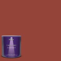 a can of behr marquee paint on a brown background