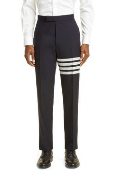 A signature quartet of satiny stripes rings one leg of crisp, smart pants tailored from pure wool with handsome mélange coloring that can go sporty or formal. 16" leg opening; 11 3/4" front rise; 17" back rise Button fly Side-seam pockets; back button-besom pockets Adjustable back strap with button closure Unhemmed. Get the perfect fit—book an appointment with one of our alterations experts Lined 100% wool Dry clean Made in Italy Smart Pants, Pants Tailored, Wool Pants, Thom Browne, Back Strap, Perfect Fit, Dry Clean, Nordstrom, Stripes