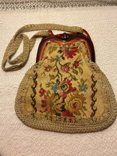 Vintage Tapestry Miriam LefCourt Elgantly Yours, Handbag, Hand Crafted in Italy Tapestry in beautiful condition, inside lining needs stitching on both sides, overall lining in good vintage condition for its age. Some light stains. Some minor scuffs on brown frame, otherwise also in beautiful vintage condition. Handbag could use a good gentle cleaning. Vintage Embroidered Travel Satchel, Vintage Beige Tapestry Bag, Vintage Embroidered Rectangular Satchel, Vintage Multicolor Handheld Shoulder Bag, Vintage Tapestry Shoulder Bag For Travel, Vintage Embroidered Tote Bag, Vintage Embroidered Handheld Shoulder Bag, Vintage Embroidered Shoulder Bag, Vintage Tapestry Handmade Bags