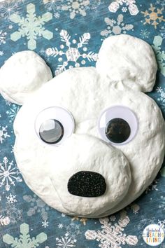 a polar bear made out of dough with googly eyes