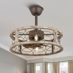 a light fixture in the middle of a living room