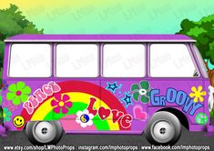 a purple bus with flowers and hearts painted on the side, parked in front of trees